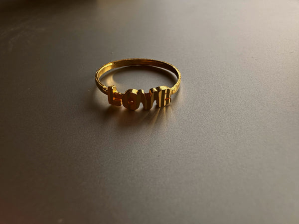 24k gold “love” rings