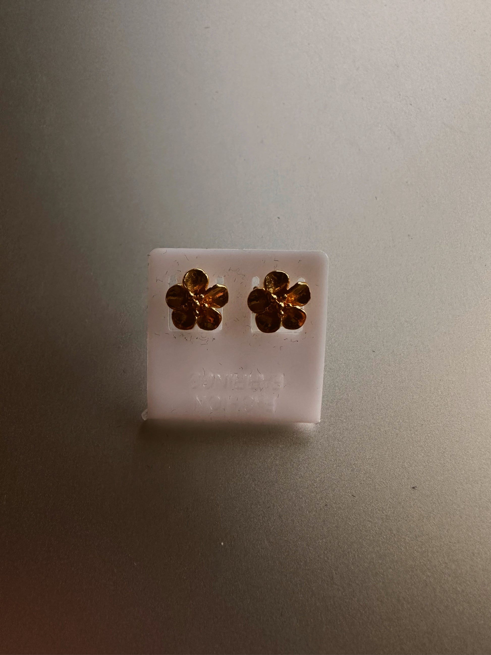 Gold flower earring