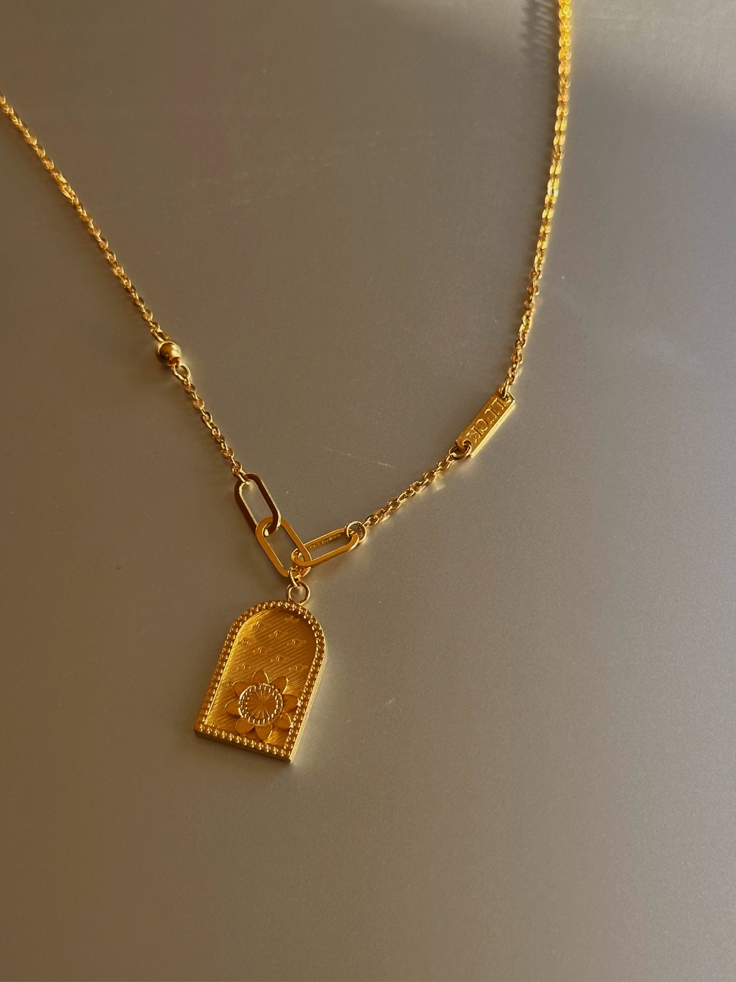 24k gold pendant