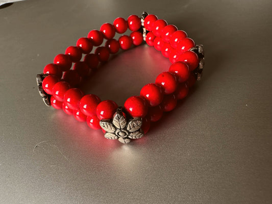 Silver flower with garnet bracelet