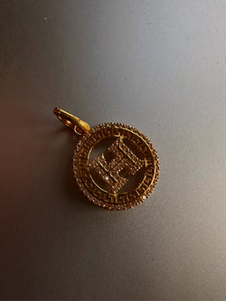 Hermes 24k gold charm