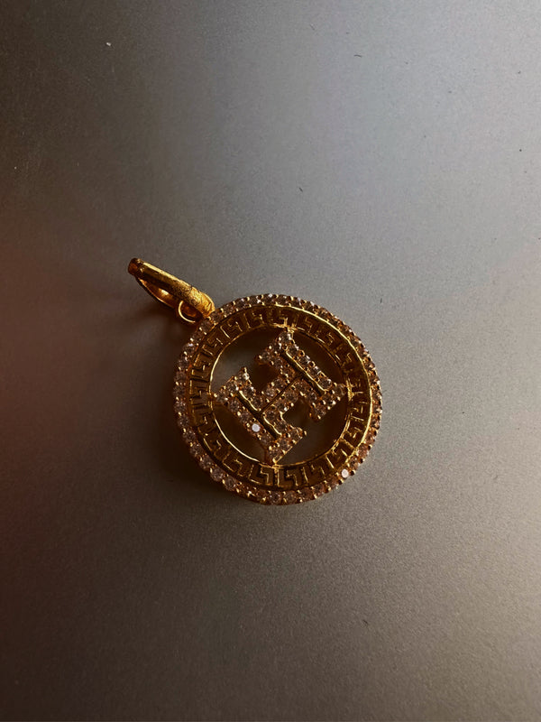 Hermes 24k gold charm