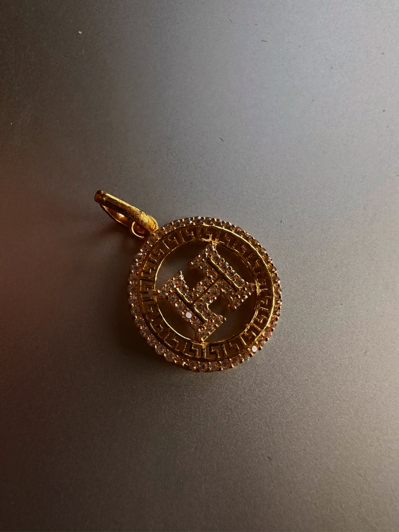 Hermes 24k gold charm