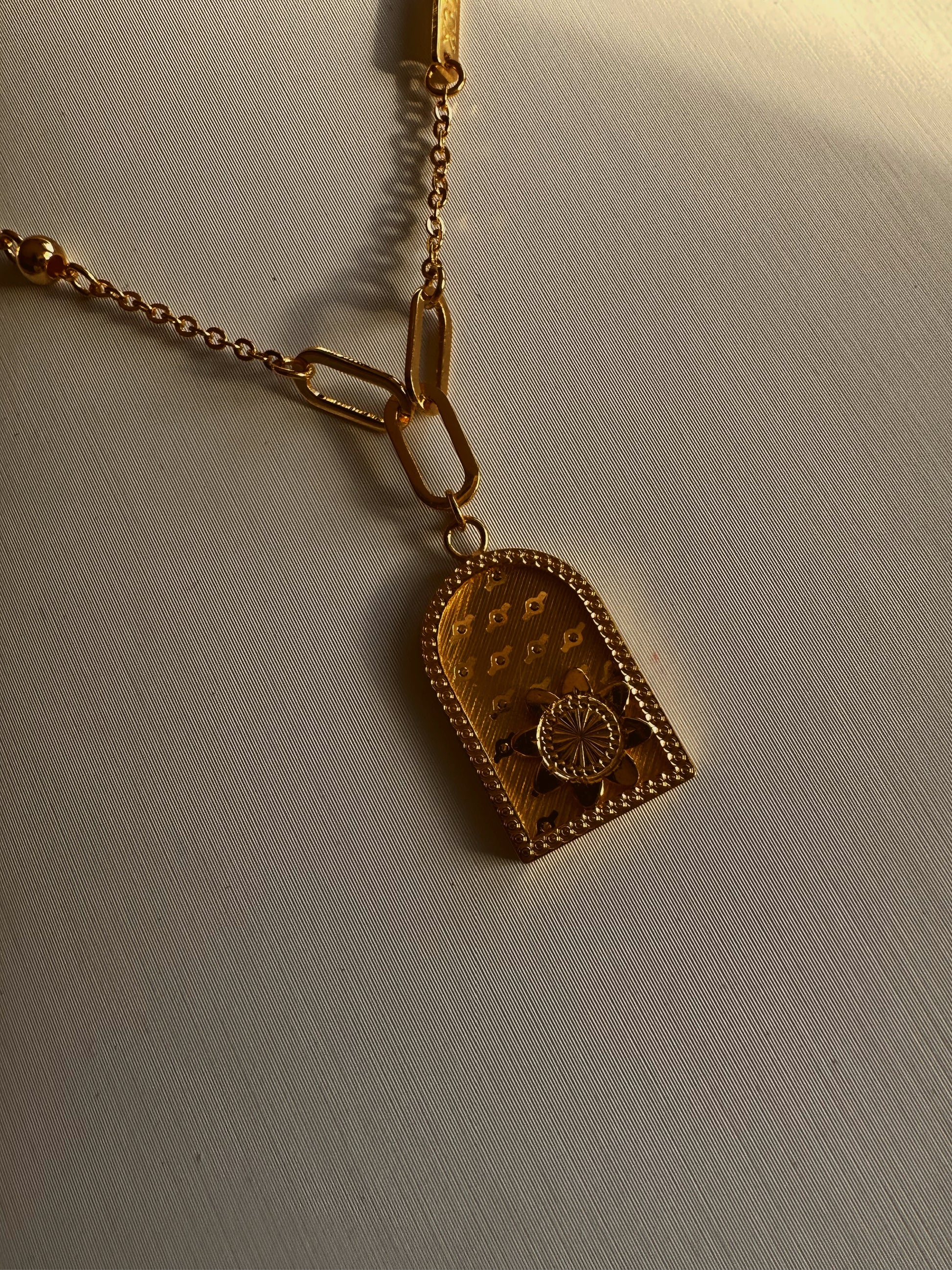 24k gold pendant